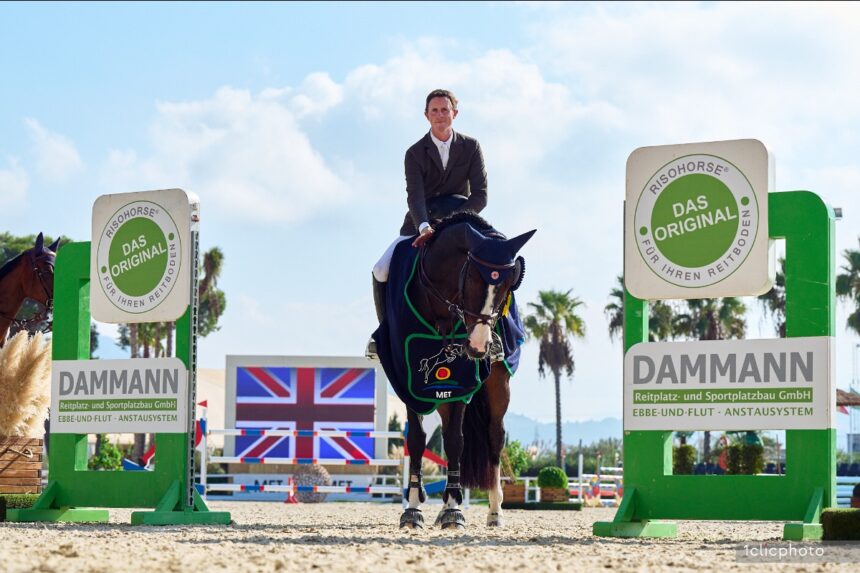 Ben Maher and Ginger-Blue best in the CSI2 Grand Prix presented by Dammann Reitplatz- u. Sportplatzbau GmbH at Autumn MET 2023 Ben Maher and Ginger-Blue best in the CSI2* Grand Prix presented by Dammann Reitplatz- u. Sportplatzbau GmbH at Autumn MET 2023